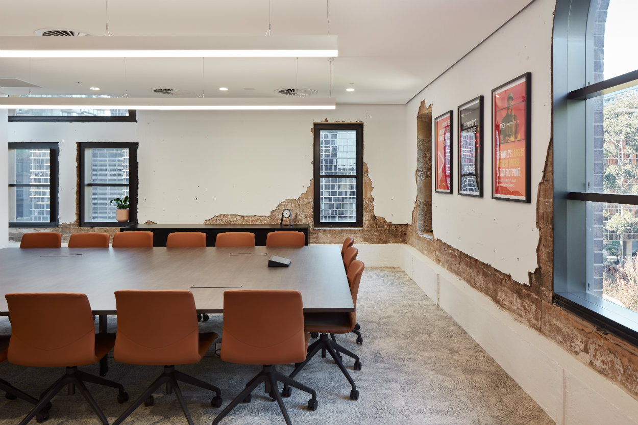 The workspace strikes a clever balance between the raw, industrial character of the heritage brewhouse